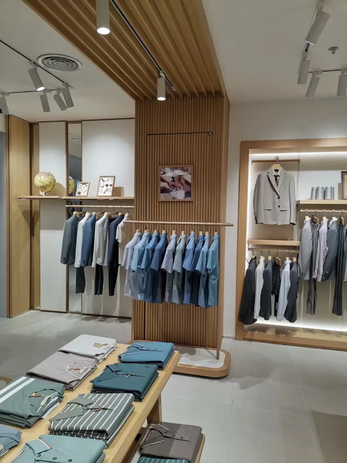 Close-up of garment rack with color-blocked tops